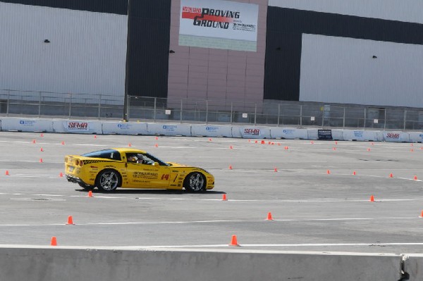 Bob Bondurant instructors take SEMA participants around SEMA MotorTrend Pro