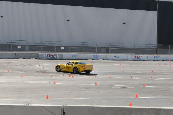 Bob Bondurant instructors take SEMA participants around SEMA MotorTrend Pro