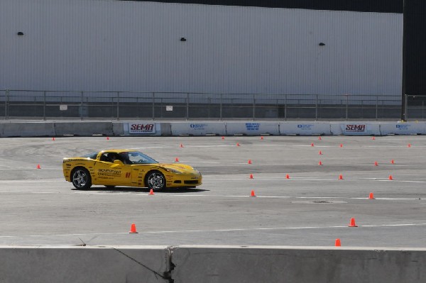 Bob Bondurant instructors take SEMA participants around SEMA MotorTrend Pro