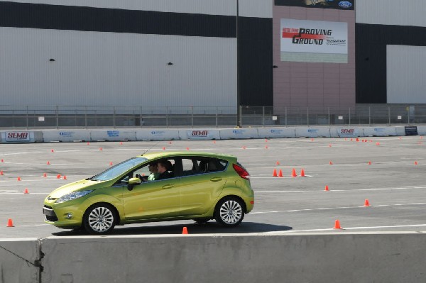 Bob Bondurant instructors take SEMA participants around SEMA MotorTrend Pro