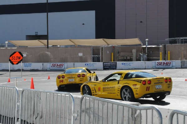 Bob Bondurant instructors take SEMA participants around SEMA MotorTrend Pro