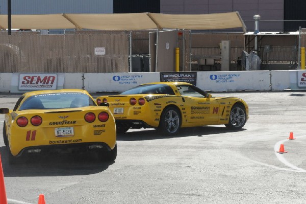 Bob Bondurant instructors take SEMA participants around SEMA MotorTrend Pro