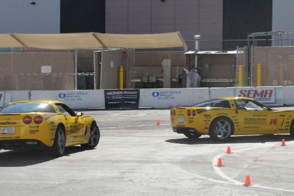 Bob Bondurant instructors take SEMA participants around SEMA MotorTrend Pro