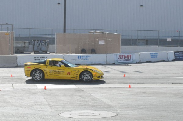 Bob Bondurant instructors take SEMA participants around SEMA MotorTrend Pro