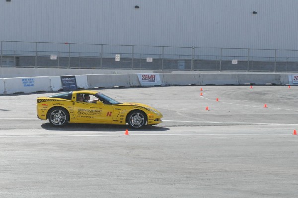 Bob Bondurant instructors take SEMA participants around SEMA MotorTrend Pro