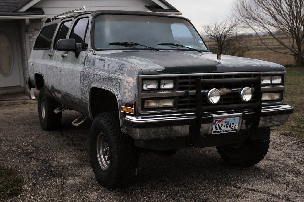 1990 Chevrolet Suburban being stripped for painting