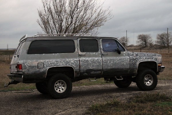 1990 Chevrolet Suburban being stripped for painting